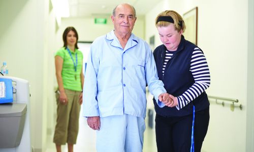Austin Nurses mobilising patient High Res - 1000px